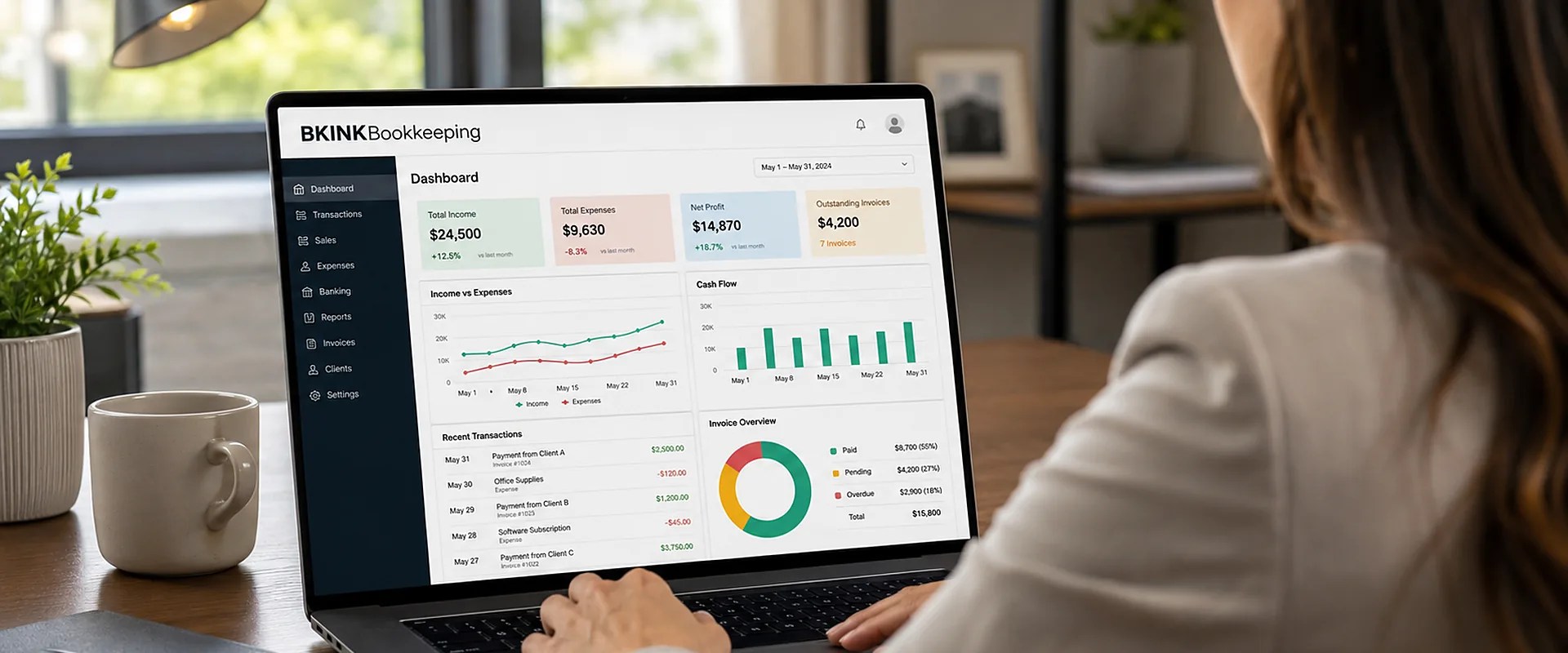 Illustrative image: bookkeeping dashboard showing income, expenses and cash flow on a laptop